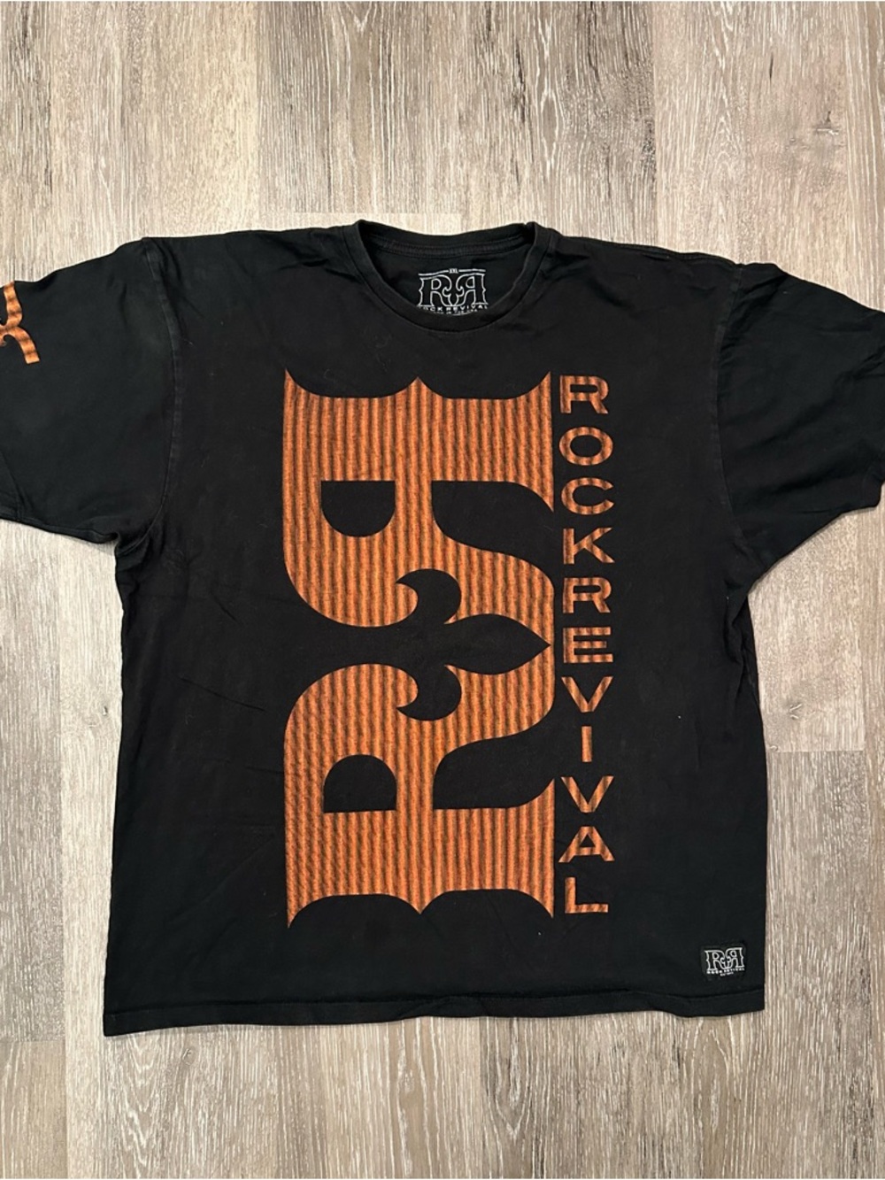 Rock Revival Black Tee with Bold Orange Graphic